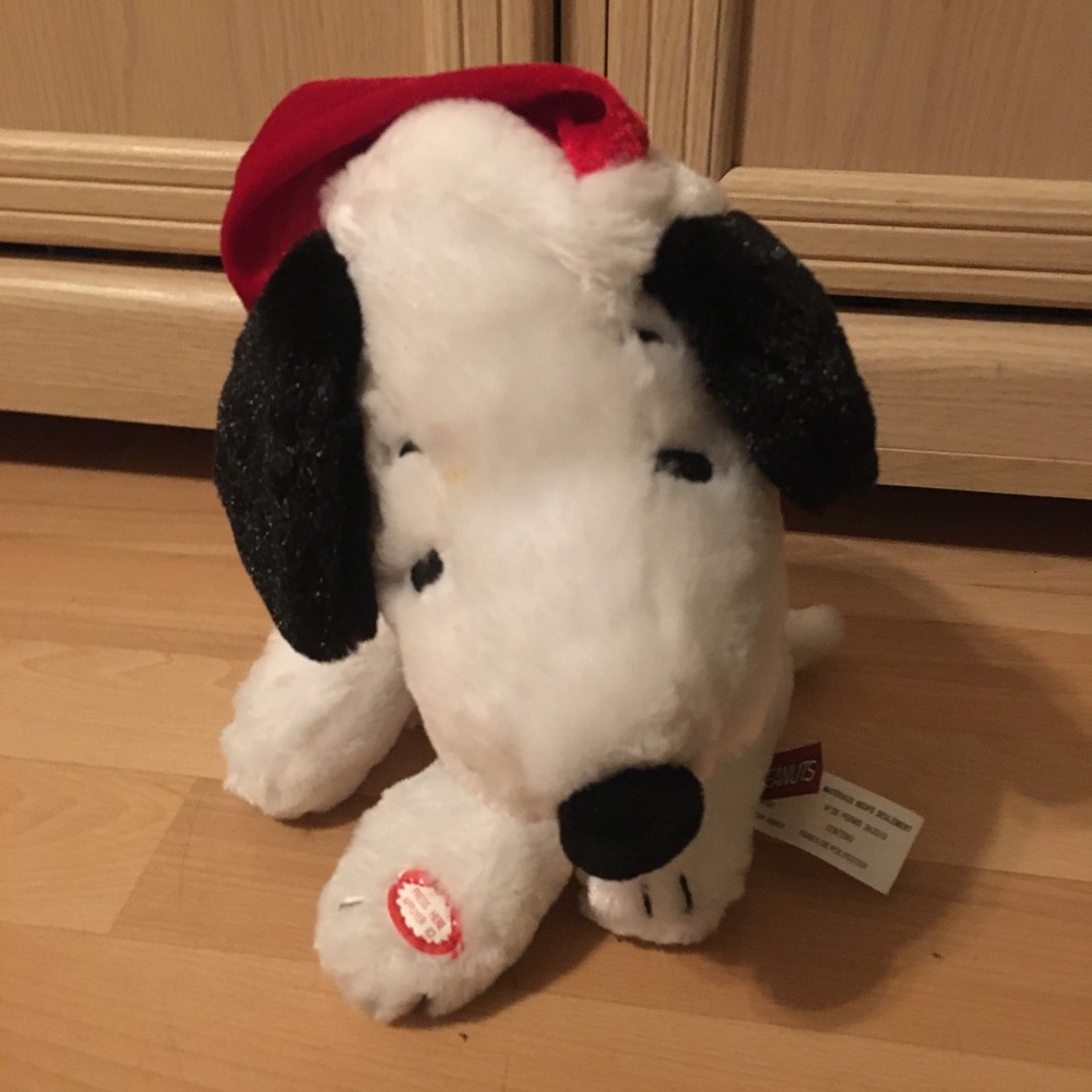 Musical Snoopy plush. Spins around and plays Peanuts theme song